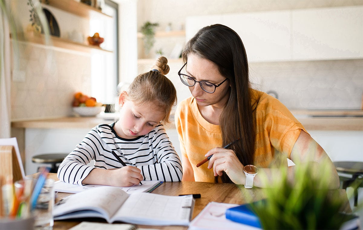 mother and daughter working on homework